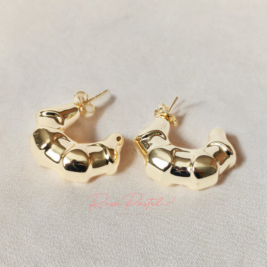 Arete en baño de oro 18k bisutería