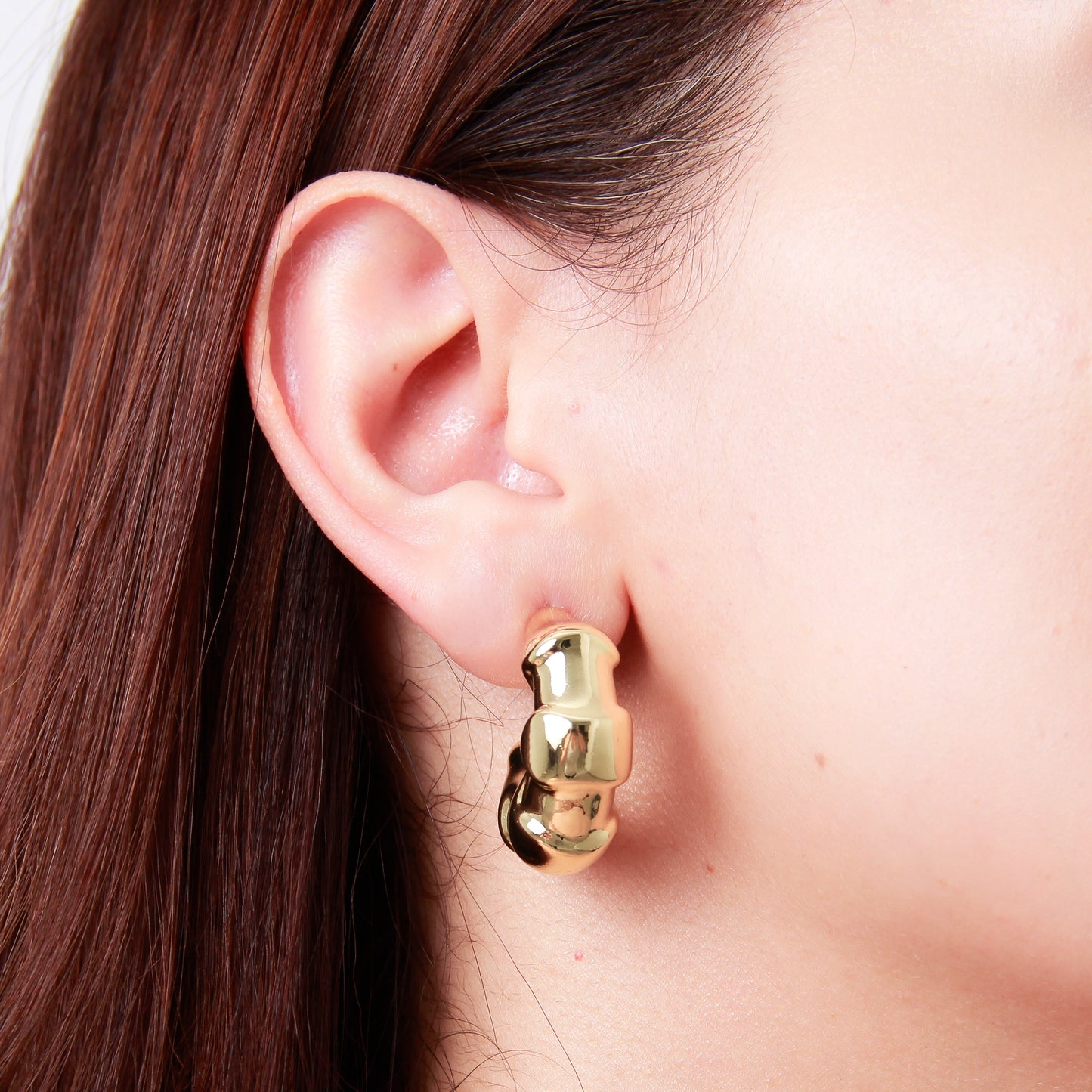 Arete en baño de oro 18k bisutería