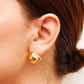 Arete en baño de oro